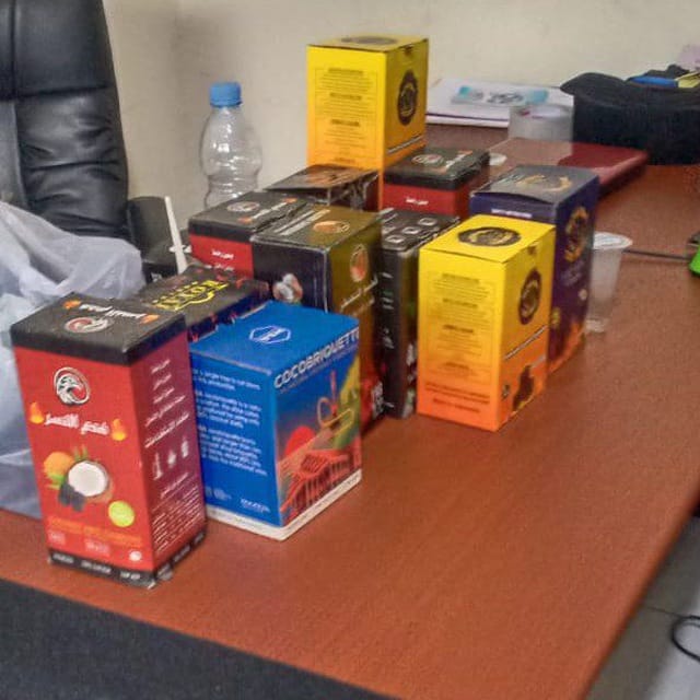 tailor charcoal brands Custom packaging of premium coconut charcoal briquettes for shisha, featuring multiple luxury brands.